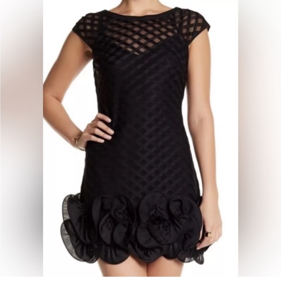 Jessica Simpson Dresses & Skirts - Jessica Simpson Black Mini ruffled Dress in a SZ 10 cap sleeves eyelet lined NEW